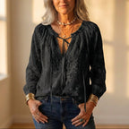 Blouse avec dentelle brodée et lien sur le devant