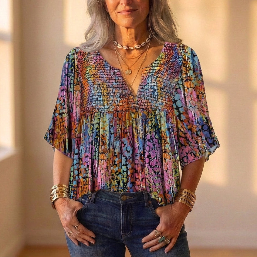 Blusa multicolor con estampado floral y fruncido