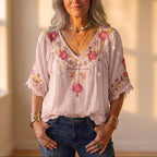 Blouse avec broderie florale et bordure en crochet