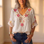 Bluse mit Blumenstickerei und Häkelbesatz