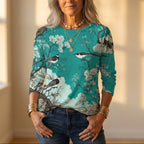 Top met vogels en kersenbloesempatroon