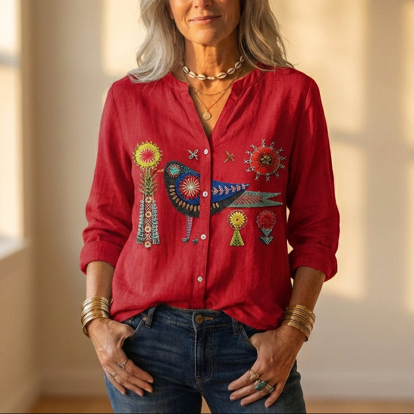 Camicia button down con uccello ricamato e disegno floreale