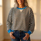 Top met gestreept ontwerp en contrasterende manchetten