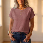 T-shirt in cotone con occhielli e motivo ritagliato all-over